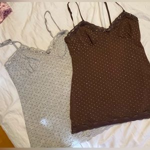 Two polka dotted Energie tank tops